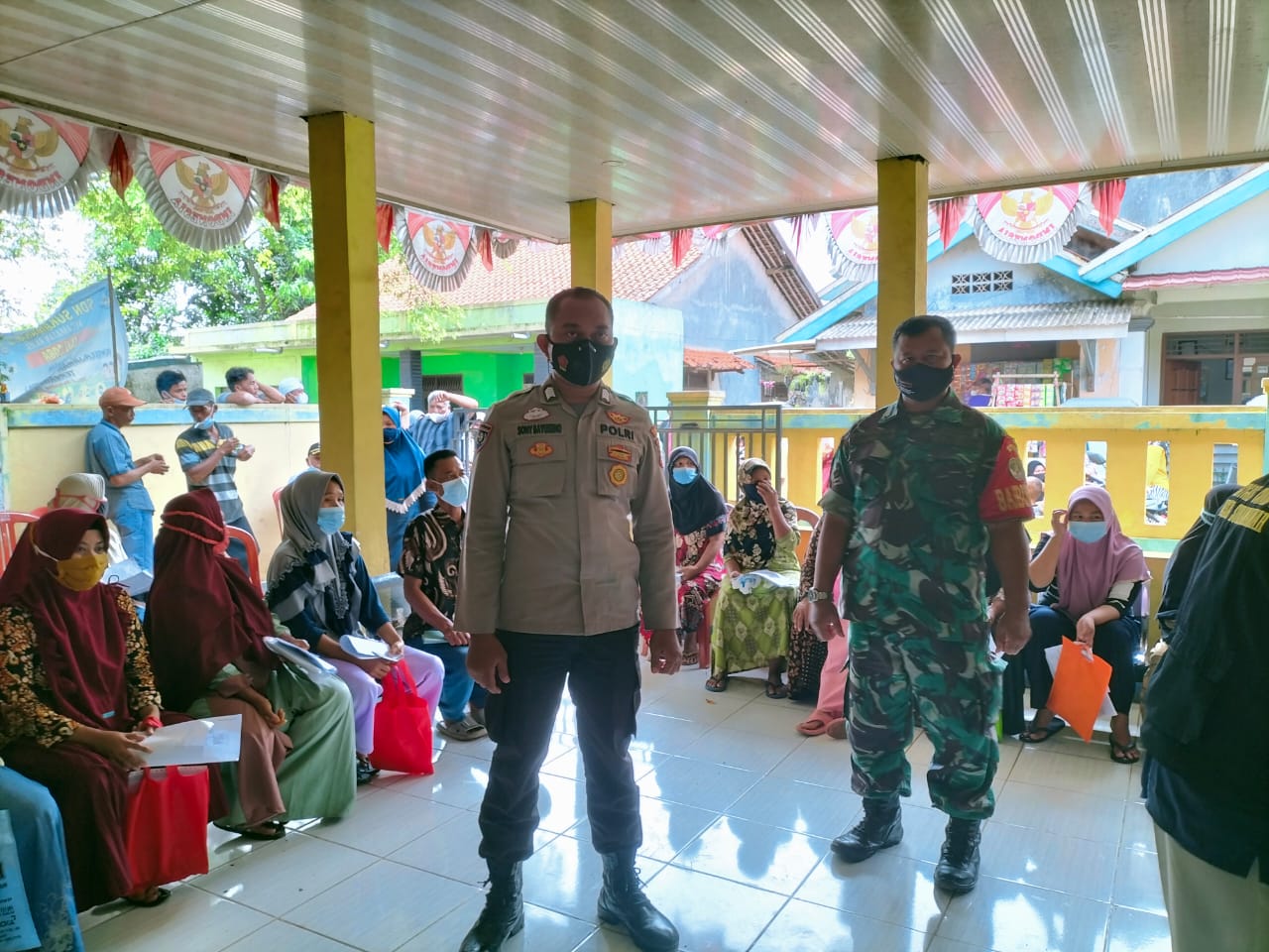 Polsek Rajeg Giat Pengamanan Pelaksanaan Pembagian BST di Desa Sukamanah